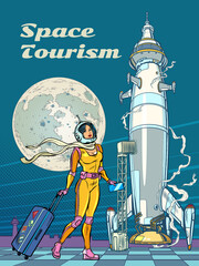 Space tourism. A female astronaut passenger goes to the rocket. Spaceport