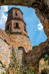 Wall Mural - Old ruined brick water tower