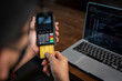 © visoot - Man hands holding credit card and using laptop or smart phone Online shopping Website,Payment transaction with card,Easy Ecommerce Website Shop Online by Smartphone.Online shopping concept.