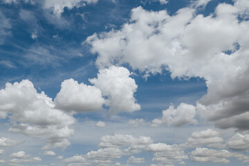 Wall Mural - white, fluffy clouds in blue sky. background from clouds