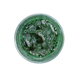 Spirulina drink in a glass isolated on white background, top view. Super drink. Organic spirulina algae drink.