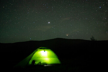 Wall Mural - beautiful night landscape, vacation with a tent in the mountains