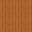 African brush stroke mud cloth fabric pattern. Ethnic boho seamless vector pattern in brown and beige, monochromatic.