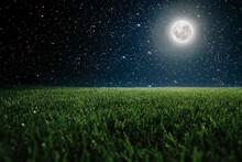 Green Field On The Background Of The Night Sky.  Elements Of This Image Furnished By NASA