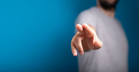Poster - Businessman pointing or touching finger in screen..