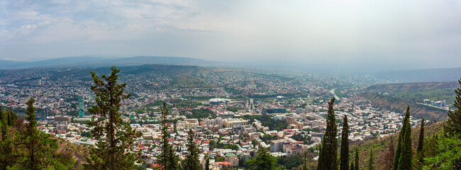 Wall Mural - Panoramic view of Tbilisi with Sameba, Trinity Church and other landmarks