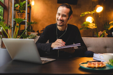 Wall Mural - hipster man or businessman working with digital communication video conference online meeting at home, business person or student work with laptop computer, technology for modern job at home office