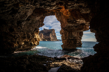 Natural cave on the coast in Spain, Benitatxell, Alicante, Cova dels Arcs