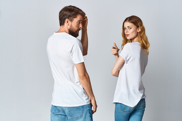 man and woman hugging in white t-shirts mockup back view