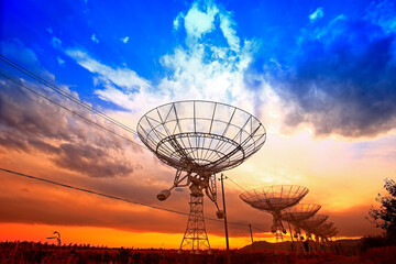 Wall Mural - the silhouette of a radio telescope observatory