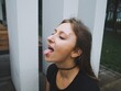 
stylish teenager, choker and stuck out her tongue