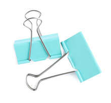 Turquoise Binder Clips On White Background, Top View. Stationery Item