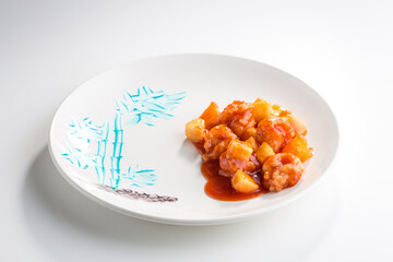 Wall Mural - fried shrimp sweet sauce with pineapple isolated on white background