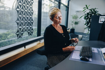 Wall Mural - Female professional taking a break from work