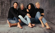 © Jacob Lund - Fashionable women of different ages laughing together