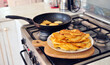 © Hadira - Cooking of Tasty potato pancakes on a stove, Ukrainian food