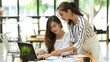 © bongkarn - Creative business female sharing her ideas to colleague, teamwork