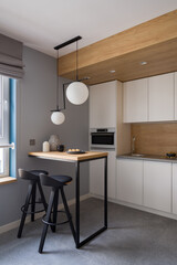 White kitchen with small table