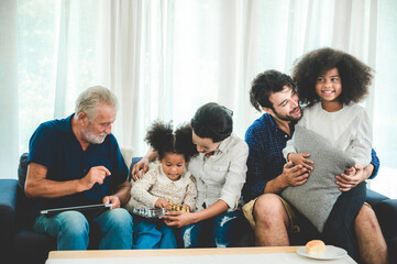 big family group with children and parent many generation meeting at home. mother father and senior grandfather having relax and happy together with daughter kid