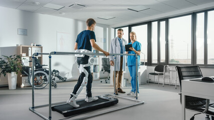Sticker - Modern Hospital Physical Therapy: Patient with Injury Walks on Treadmill Wearing Advanced Robotic Exoskeleton. Physiotherapy Rehabilitation Scientists, Engineers, Doctors use Tablet Computer to Help