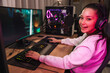 © Drobot Dean - Happy young woman streamer gamer in headphones