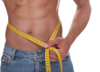 Wall Mural - Shirtless man with slim body and measuring tape around his waist isolated on white, closeup