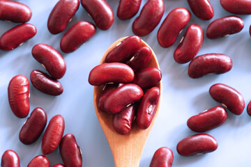 Wall Mural - Red Kidney beans and wooden spoon