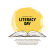 international literacy day with open book illustration, yellow brush and white background