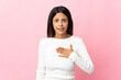 © luismolinero - Caucasian girl isolated on pink background pointing to oneself