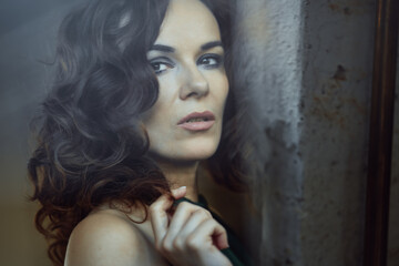 Canvas Print - Shallow focus shot of an elegant European woman from Germany with a serious facial expression