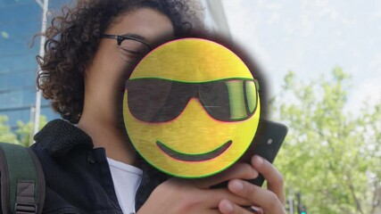 Poster - Animation of happy emoji over man using smartphone