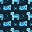 A blue tiger with snowflakes on a dark blue background. Seamless pattern with the symbol of the new year 2022. watercolor ornament of animals. Cute Maltese tiger cub. Holiday print