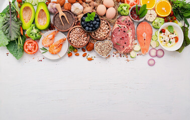 Wall Mural - Ketogenic low carbs diet concept. Ingredients for healthy foods selection set up on white wooden background.