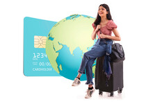 A Young Woman Sitting With Her Luggage With A Graphic Of Global Net-banking.