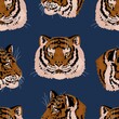 Tigers heads vector seamless pattern. Wild cats portraits colored retro ornament. Eastern calendar symbol of the year. Design for print, fabric, textile, background, wallpaper, wrap, card, decor etc.