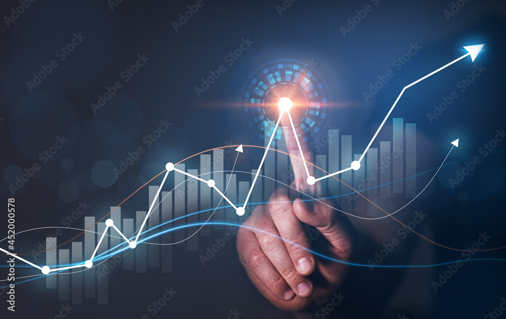 Businessman draw growth business graph progress and financial analyzing ...