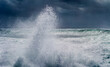 © SuperStock - Wave curling over and breaking during cyclone Ola with stormy sky