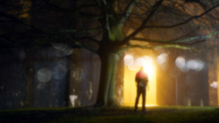 Wall Mural - A mysterious figure standing by street lights on a misty winters night. With a blurred, bokeh, out of focus edit