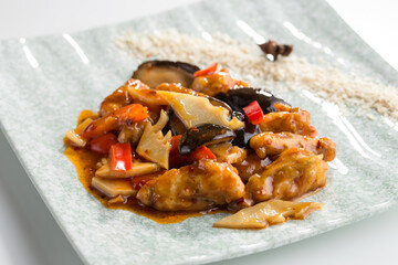 Wall Mural - Chinese Deep Fried Pork With Sweet and Sour Sauce and pepper isolated on white background