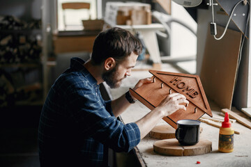 Wall Mural - Woodworker applying glue to coards