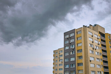 skyscrapers in sleeping quarters on thunderstorm background. Living, lifestyle, building concept