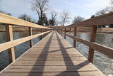 Fototapeta Sawanna - wooden dock on a lake