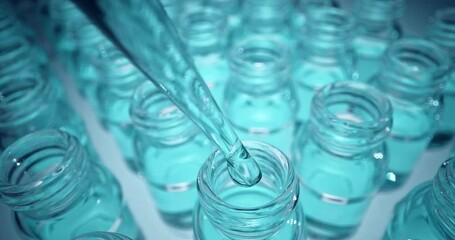 Wall Mural - pharmaceutics laboratory: pipette dropping liquid into test tubes, medical research, analysis. scien