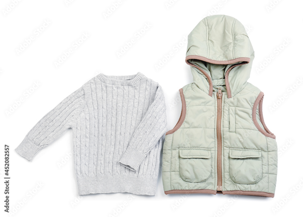 Stylish baby clothes on white background