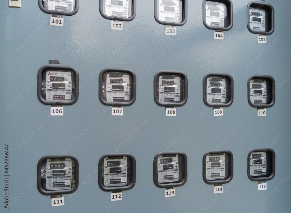 Electrical control meter panel board with number showing. Power plug of ...