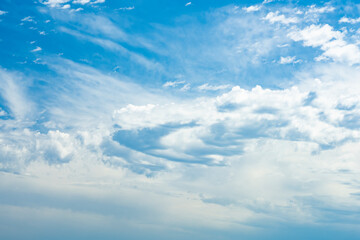 Wall Mural - Stunning view of a blue sky with some clouds during a sunny day. Natural background with copy space