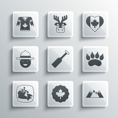 Sticker - Set Canadian maple leaf, Mountains, Bear paw footprint, Paddle, Canada, ranger hat, Hockey jersey and Heart shaped flag icon. Vector