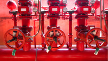 Red Valve In Oil And Gas Process. Red Valves On Metal Pipe. Valve Is A Device That Fire Valve, Installation Of Fire Safety, Security Fire System In Industry Or The Process 