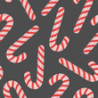 Hand drawn Christmas candy cane seamless pattern. Winter holiday background