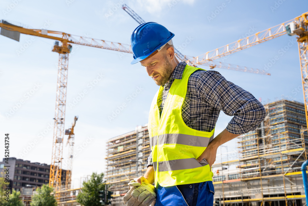 Engineer With Back Pain Injury After Accident Stock Photo | Adobe Stock